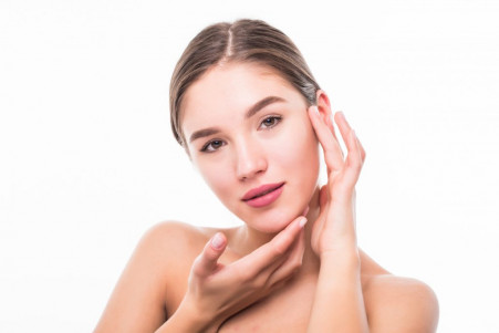 beautiful spa young woman touching her face isolated white wall 1024x683 1