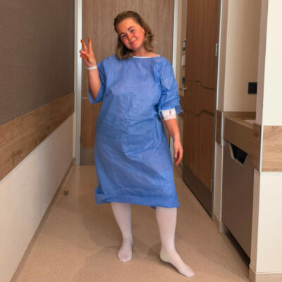 Chloe in her surgical gown before surgery
